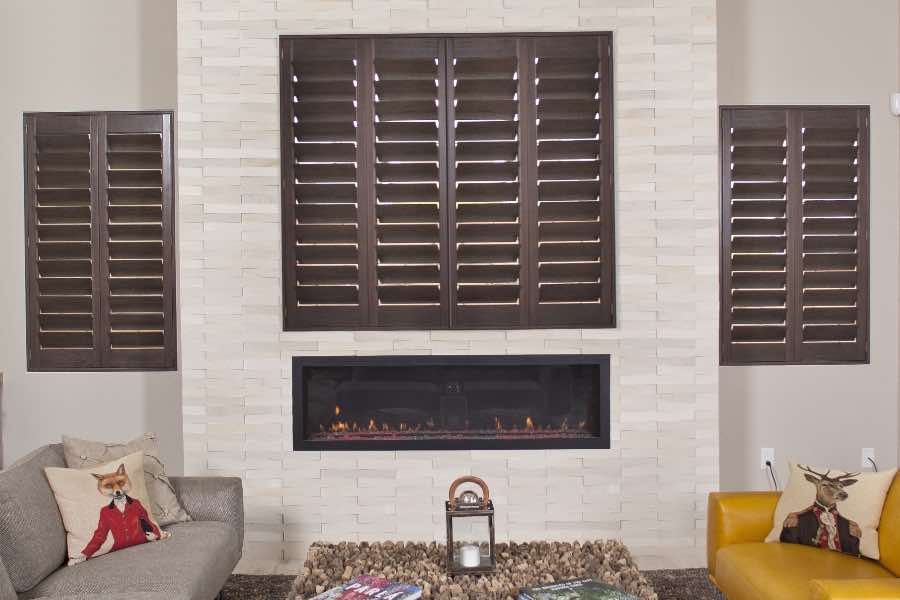 Wood shutters on living room windows